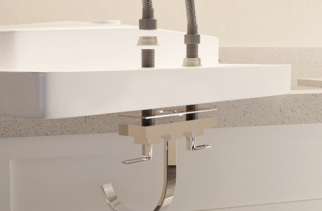 Install a sink and faucet on the bathroom vanity